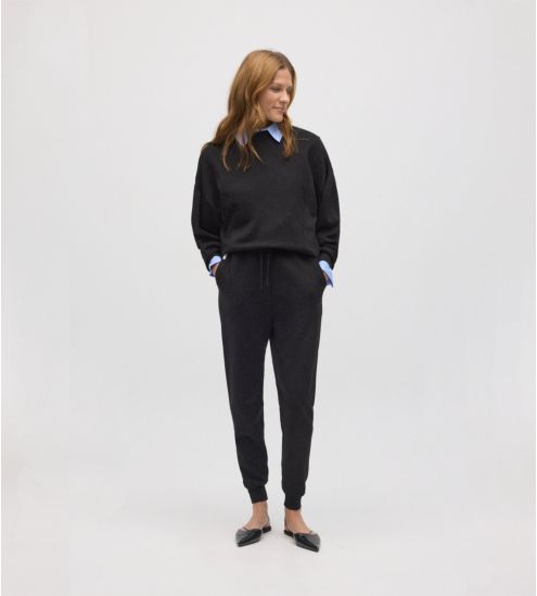 Pantalon de jogging noir pour femme resserré aux chevilles
