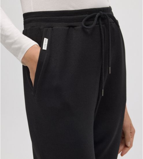 Pantalon de jogging noir pour femme resserré aux chevilles