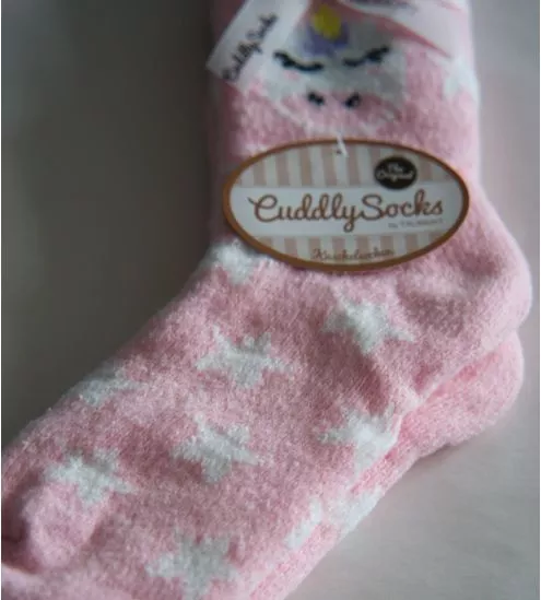 Chaussettes licorne rose et étoiles blanches doublées
