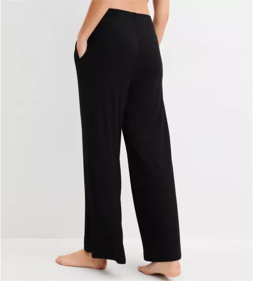 Black wide-leg trousers...