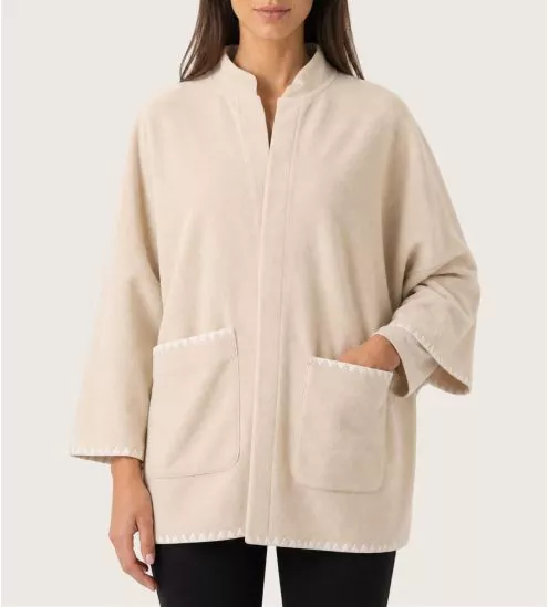 Beige chunky-knit jacket...