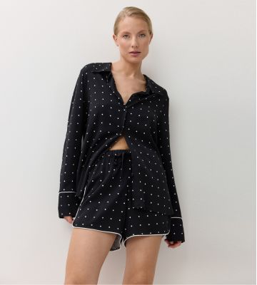 Pyjama chemise short noir à pois blancs